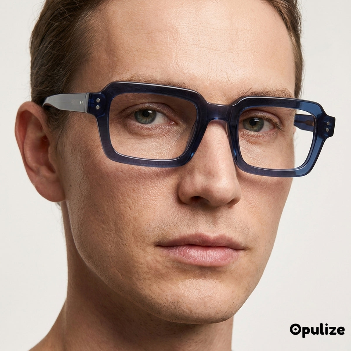 EDG zero strength blue light glasses in blue, worn by a model